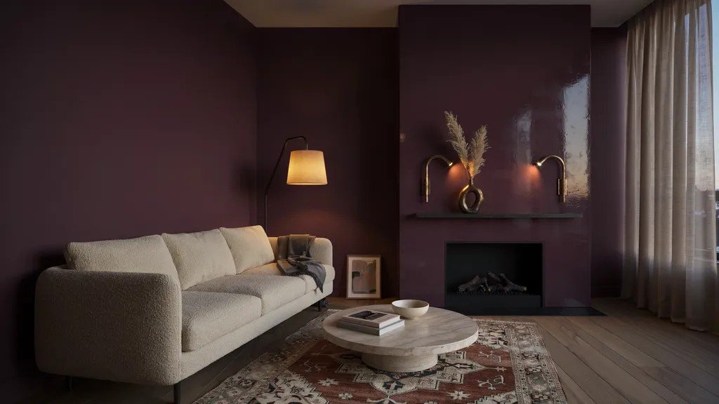 Moody plum fireplace accent wall adding depth, drama, and distinctive style.