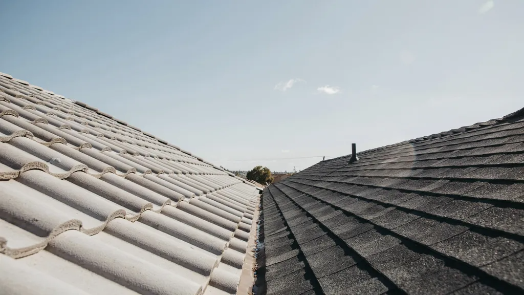 Light and dark roofs showing differences in heat absorption under direct sunlight.