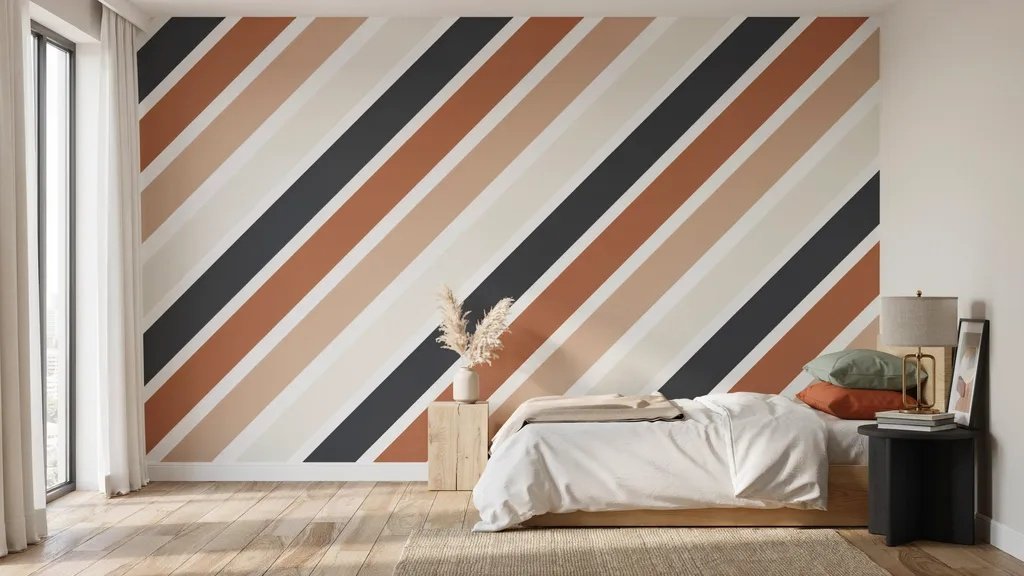 Bold diagonal stripe accent wall with contrasting colors adding movement and modern style to the room.