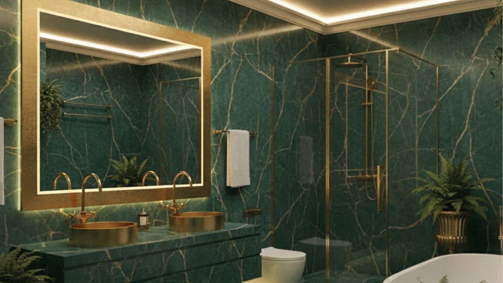 Dramatic emerald marble bathroom with gold bowl sinks, backlit mirror, glass shower, and ferns.