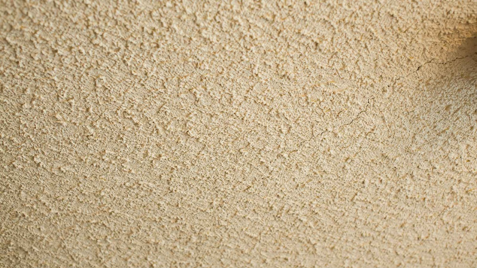 Popcorn ceiling texture close-up.