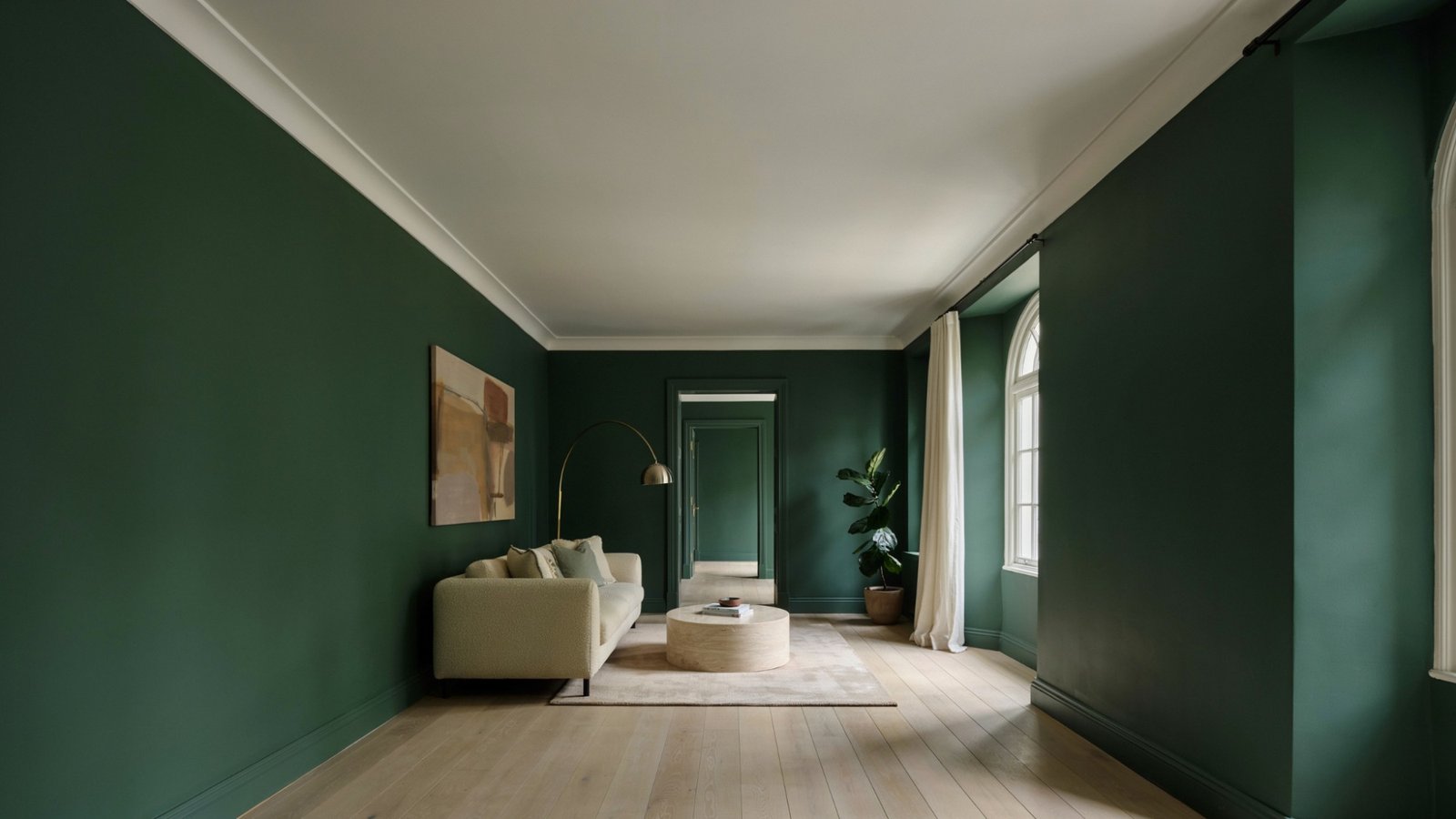 Dark green walls paired with a white ceiling to make the room feel taller.