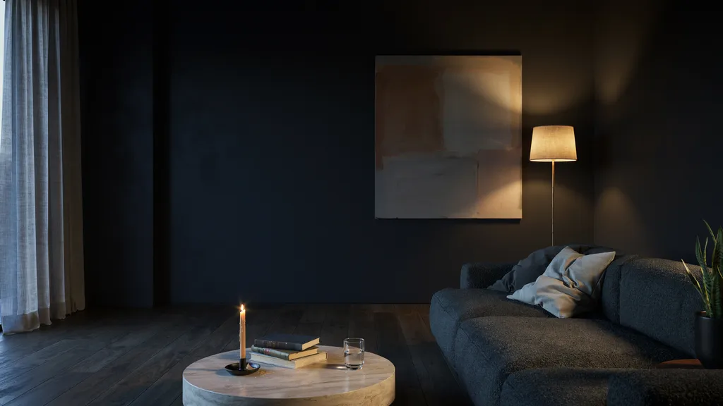 Flat black walls absorbing light and making a dark room feel smaller.
