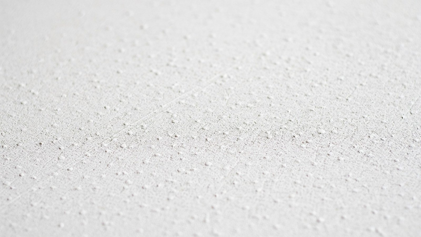 Orange peel ceiling texture close-up.