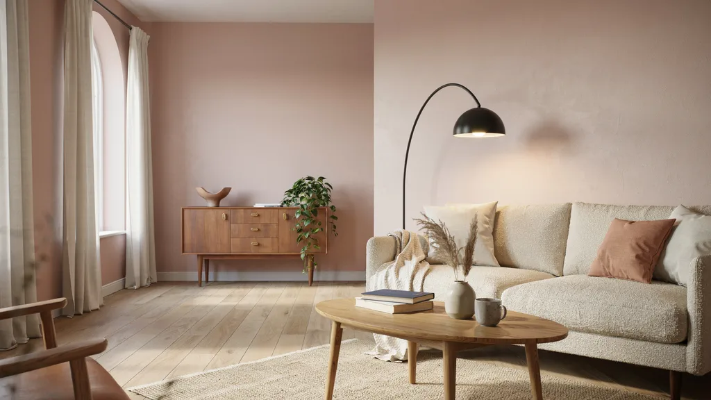 Blush pink walls making a dark room feel brighter and more inviting.